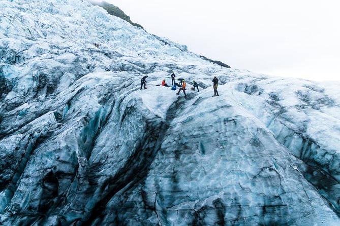 2-Day Ice Cave & South Coast: Glacier Hike and Glacier Lagoon - Day 1 begins with two classic waterfalls