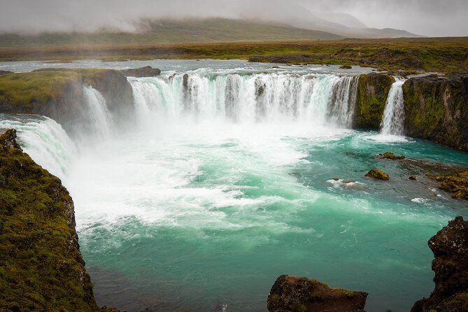 7-Day Small Group Journey Around Iceland - Day five: icebergs, black sand, and two famous waterfalls