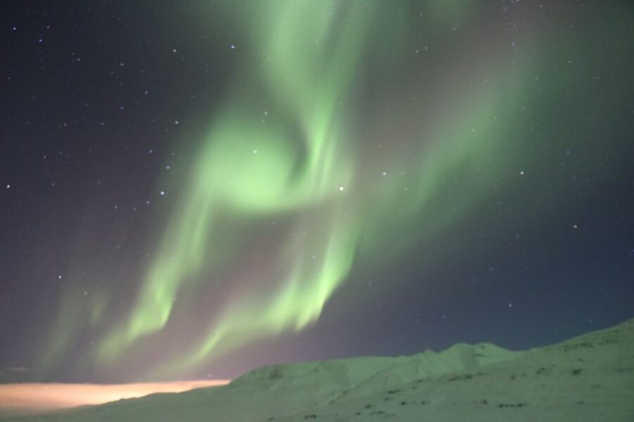 Akureyri: Hunt for the Northern Lights Photography Tour - Chasing darkness beyond Akureyri