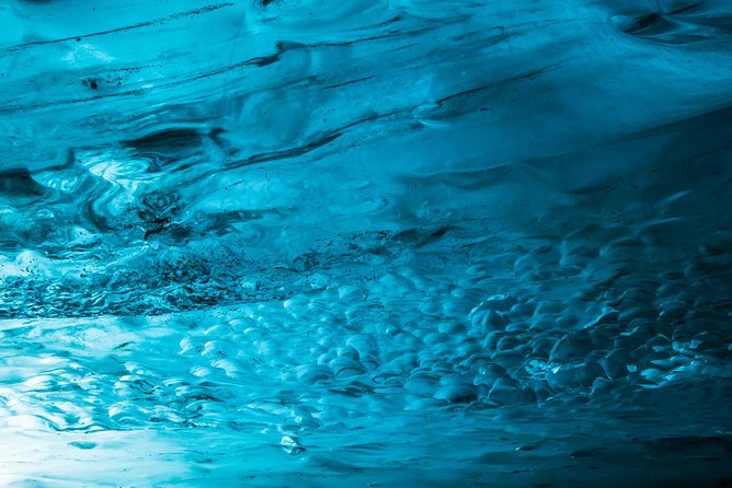 Blue Ice Cave Adventure - Entering an ice cave chosen for current conditions
