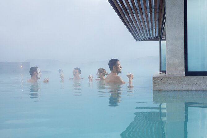 Blue Lagoon Admission Including Return Transfers from Reykjavik - Moving through the water, masks, and quiet areas