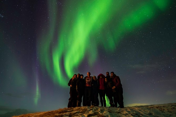 Blue Lagoon and Northern Lights Tour Including Admission - Searching the sky by northern lights bus