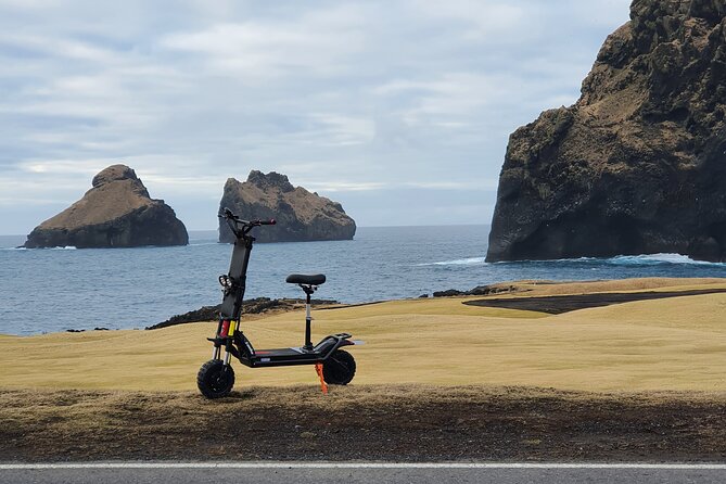 Eyjascooter volcano tour in Westman Island - Riding Through Town and Out Toward the Coast