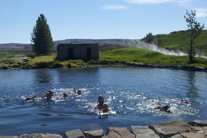 Fludir Secret Lagoon Admission Ticket Only - The geothermal pool and its bubbling neighbors