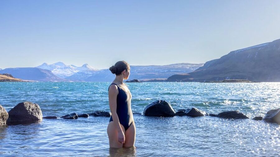 From Reykjavík: Golden Circle Route & Hvammsvik Hot Spring - Kerið Crater gives you red earth and a blue lake