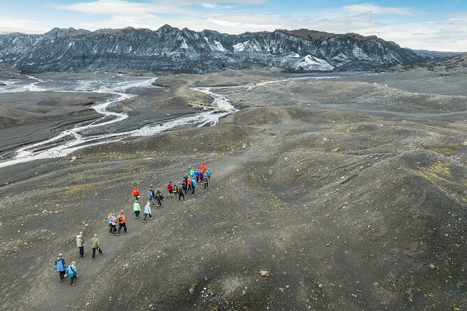 From Reykjavik: Katla Ice Cave and South Coast Day Tour - Reynisfjara, black sand, and dangerous beauty