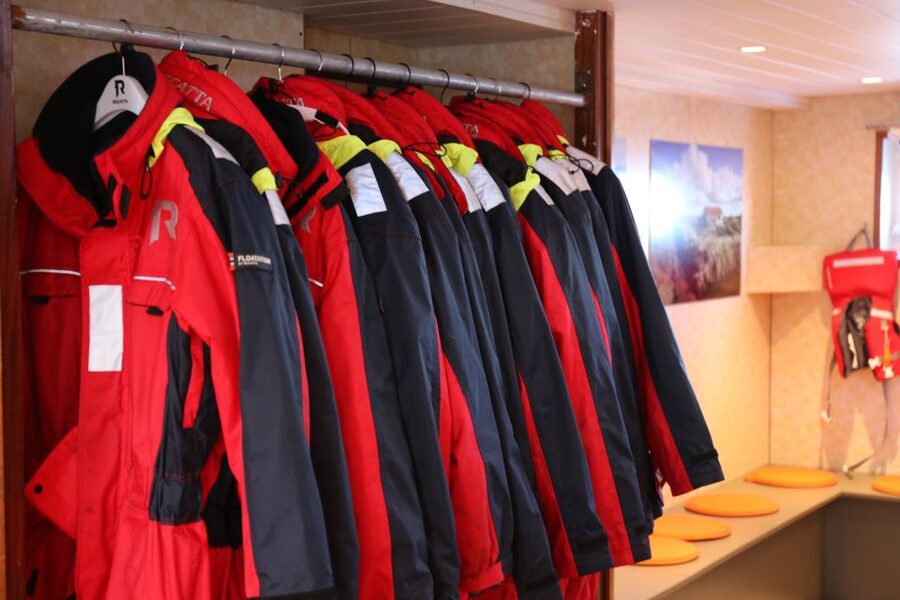 From Reykjavik: Northern Lights Boat Cruise - The open deck, indoor cabin, and warm overalls