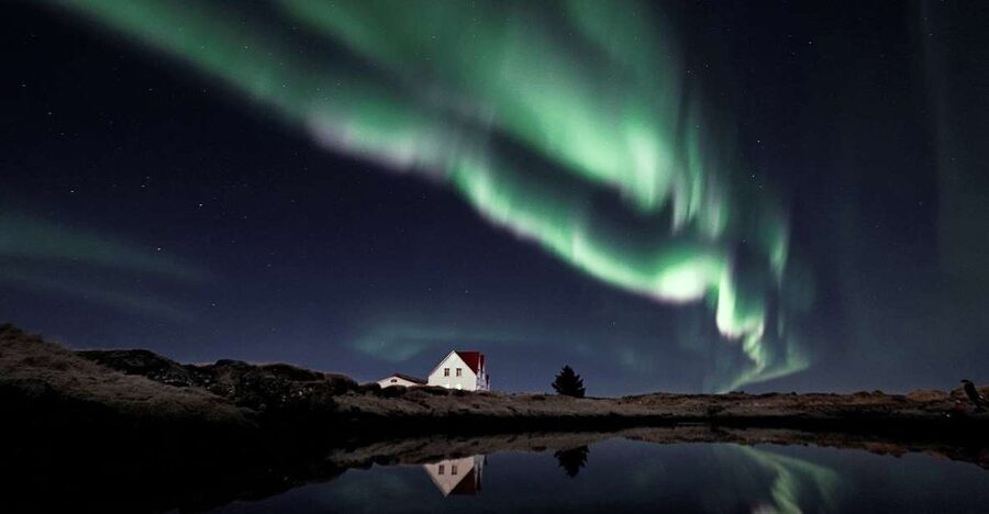 From Reykjavik: Northern Lights Tour with Hot Cocoa & Photos - Searching for the secret stop