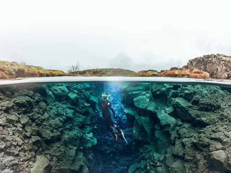 From Reykjavik: Silfra Snorkeling with Free Photos - The safety briefing and first moments in Silfra