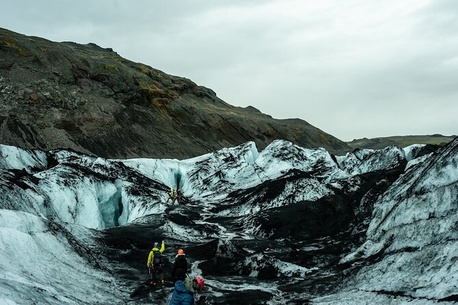 Glacier Hike at Solheimajokull in Small Group (6 pers max) - Coffee, Snacks, and the Return to the Car