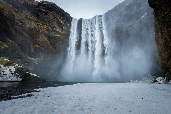 Guided Glacier Lagoon and Diamond Beach Day Trip from Reykjavik - Skógafoss: a 60-meter waterfall with real force