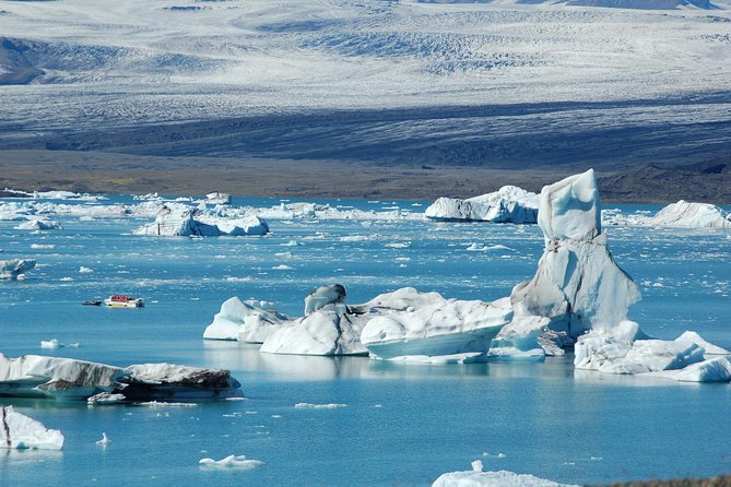 Guided Glacier Lagoon and Diamond Beach Day Trip from Reykjavik - Vík, dinner, and the return through the waterfalls