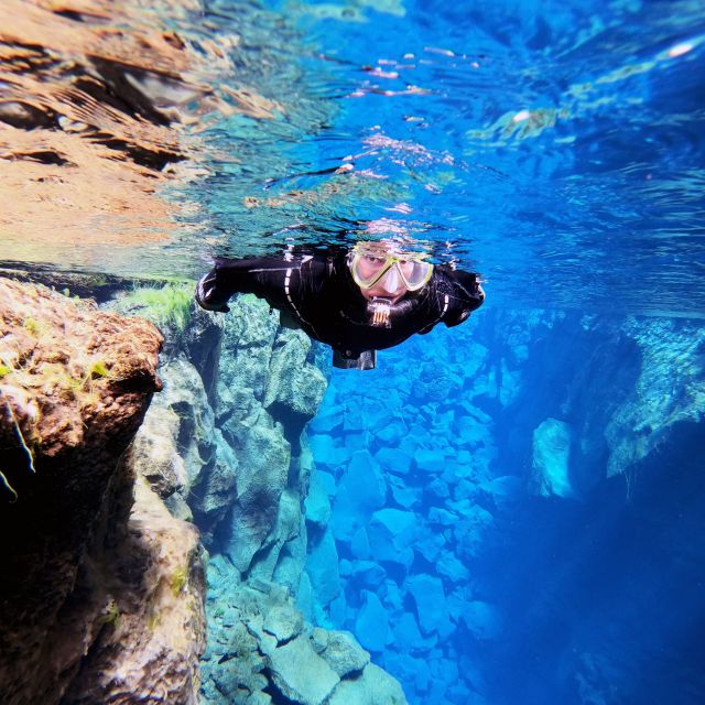 Iceland: Silfra Snorkeling Tour and Sky Lagoon Spa Combo - Floating through Silfra’s clear fissure