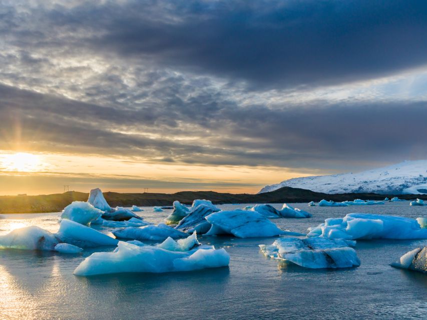 Jökulsárlón Floating Glacier & Diamond Beach Day Tour - Jökulsárlón, where the ice drifts toward the sea