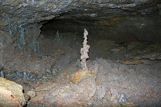 Lava Tunnel Caving with Transfer | Small Group - Cold Air, Wet Rock, and the Right Clothing