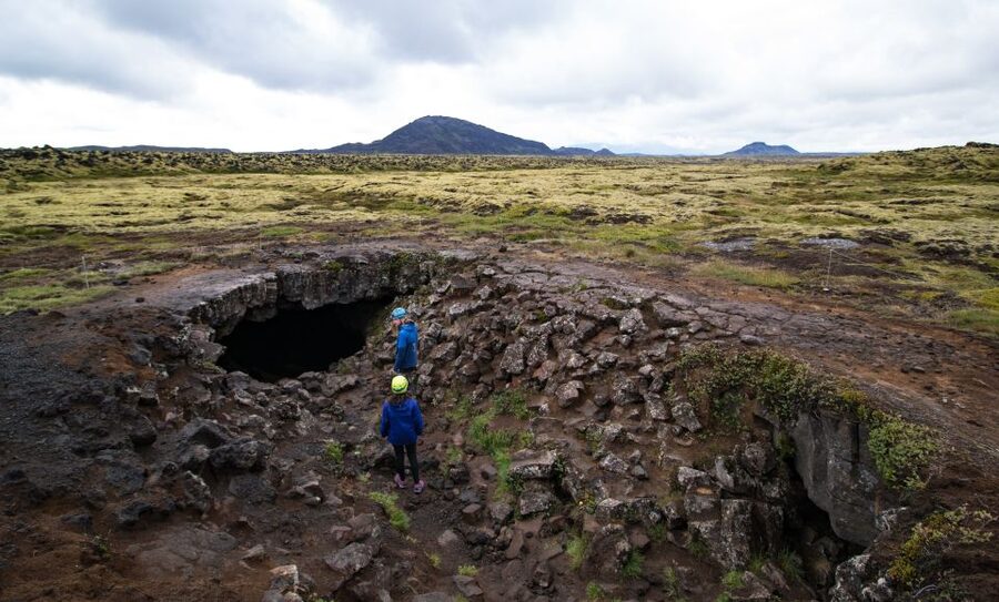 Leidarendi Cave: Lava Tunnel Caving from Reykjavik - Helmet lights, black rock, and tight passages