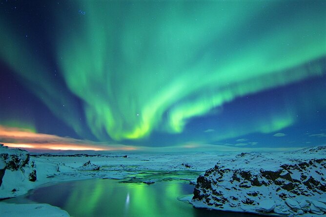 Northern Lights Bus Tour from Reykjavik with Hot Chocolate - Pickup, group size, and the four-hour schedule