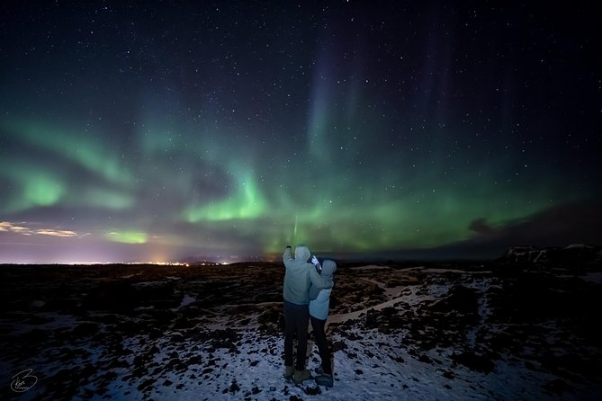 PRIVATE Northern light photo infused tour - Searching for the right sky