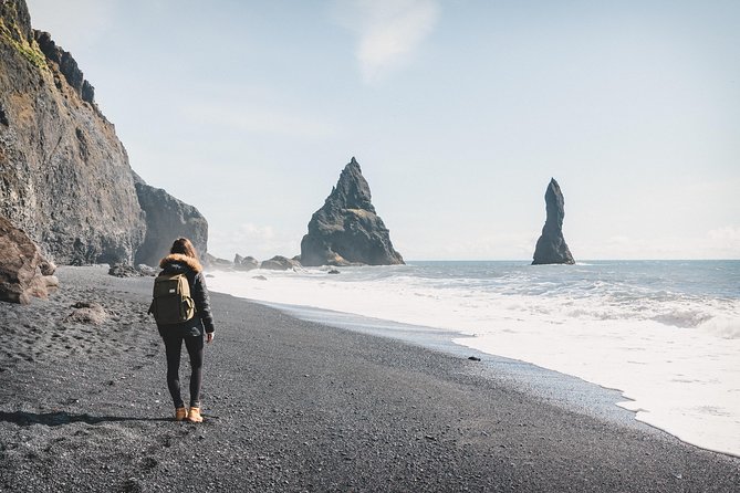 Private South Coast Fire and Ice: Glacier viewpoint & Lava Show - Reynisfjara: black sand, basalt, and serious surf