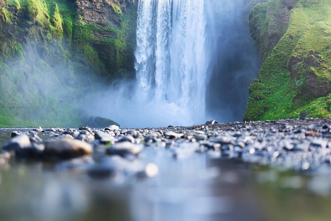 Private South Coast & Katla Ice Cave Tour in Iceland - Skógafoss brings the scale
