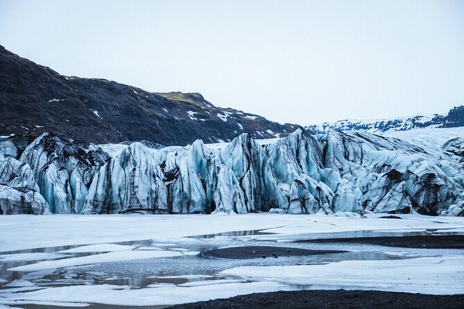 Private South Coast with Glacier Hike in Iceland - Reynisfjara is beautiful, powerful, and not a place to be careless