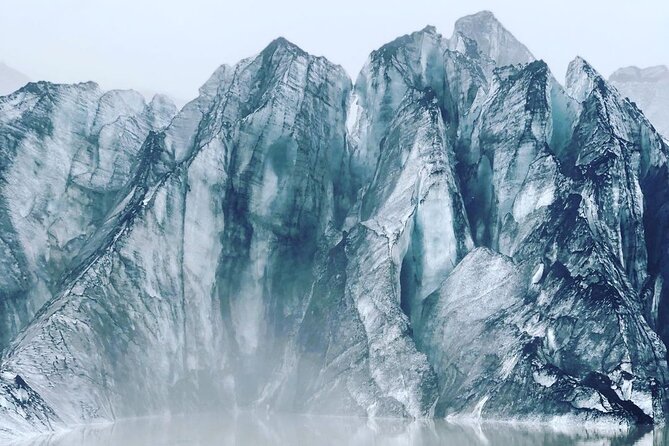 Private tour to the South Coast of Iceland - Sólheimajökull: ice marked by volcanic ash