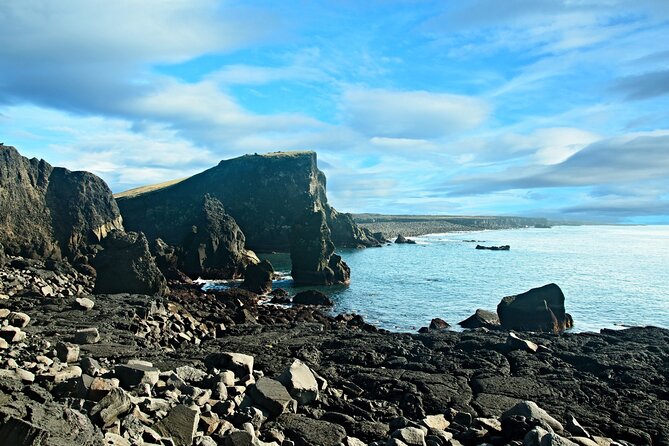 Reykjanes Peninsula: Volcanos & Blue Lagoon Self-Guided Tour - Reykjanes Lighthouse and Valahnukamol’s odd-looking birds