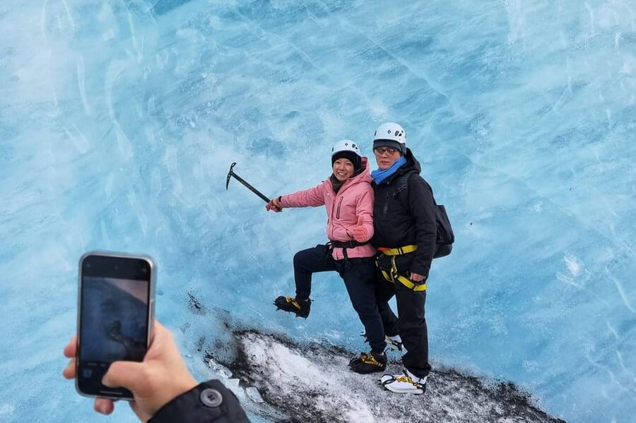 Reykjavik: Glacier Hike, Waterfalls and Black Sand Beach - Skógafoss, a waterfall with scale