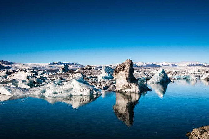 Reykjavik: Glacier Lagoon, Diamond Beach & South Coast Day Tour - Diamond Beach and the luck of the tide