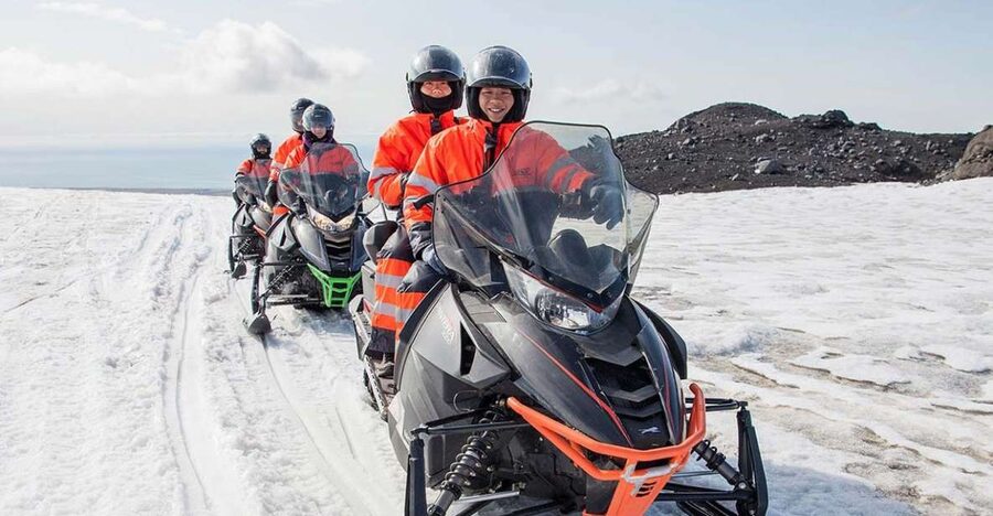 Reykjavik: Iceland South Coast & Glacier Snowmobile Tour - Riding the modified glacier truck to Mýrdalsjökull