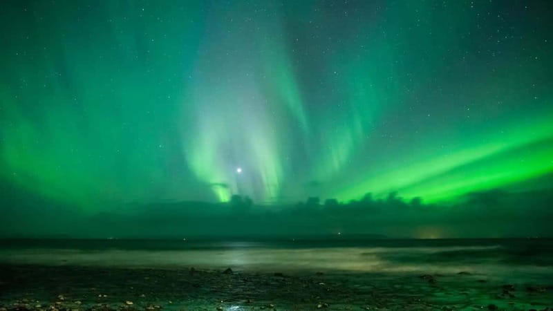 Reykjavik: Northern Lights Adventure Tour with Hot Chocolate - Leaving Reykjavik’s city glow behind