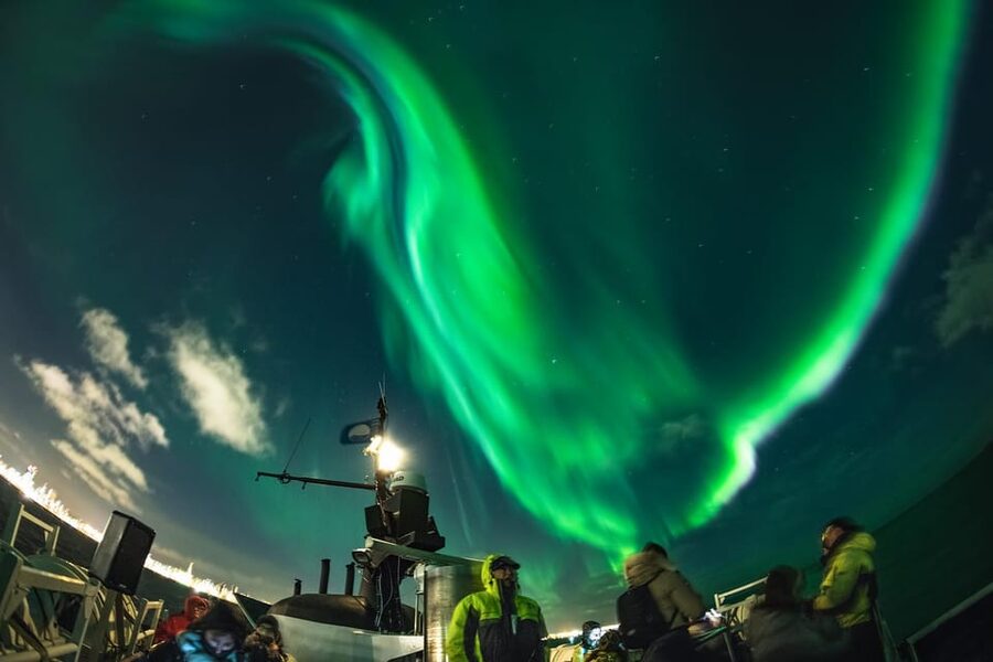 Reykjavik: Northern Lights Guided Boat Tour with Photos - Searching for the aurora over the North Atlantic