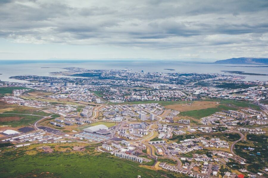 Reykjavik: Panoramic Helicopter Flight with Summit Landing - Leaving the City for the Summit