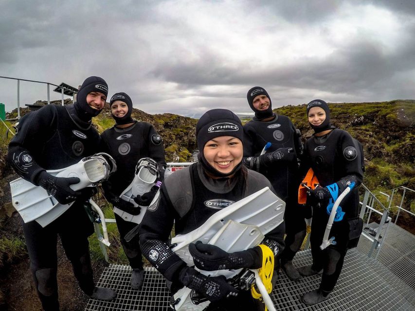 Silfra: Fissure Snorkeling Tour with Underwater Photos - Warming up with drinks and cookies