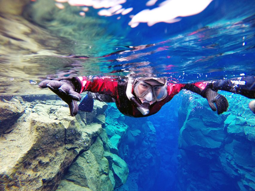 Silfra: Half-Day Snorkeling Day Trip with Underwater Photos - Entering Silfra and finding the blue