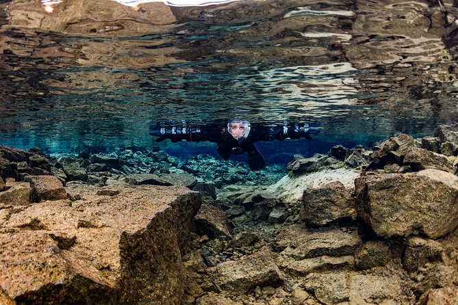 Silfra: Snorkeling Between Tectonic Plates Pick Up from Reykjavik - Getting fitted in the heated changing van