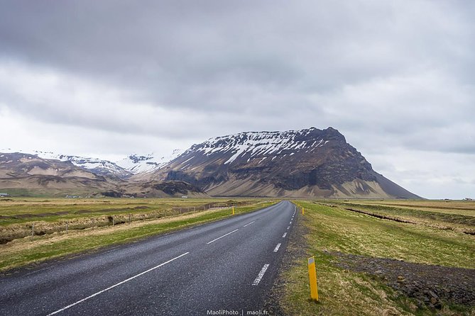 South Coast and Glacier Lagoon Day Trip by Super Jeep from Reykjavik - Dyrhólaey and Reynisfjara show Iceland’s darker coast