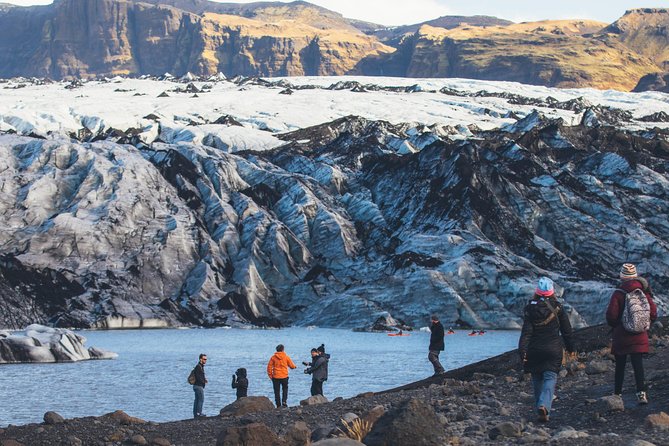 South Coast Day Tour Black Sand Beach & Waterfalls from Reykjavik - Pickup in Reykjavik and the ride south