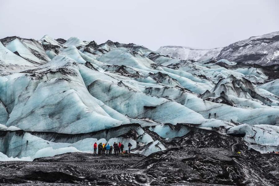 South Coast, Glacier Hike and Northern Lights Winter Tour - Seljalandsfoss and the walk behind the water