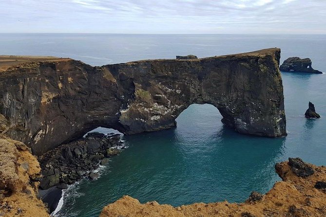 South Coast. Private Day Tour from Reykjavik - Skogafoss: spray, stairs, and a possible rainbow